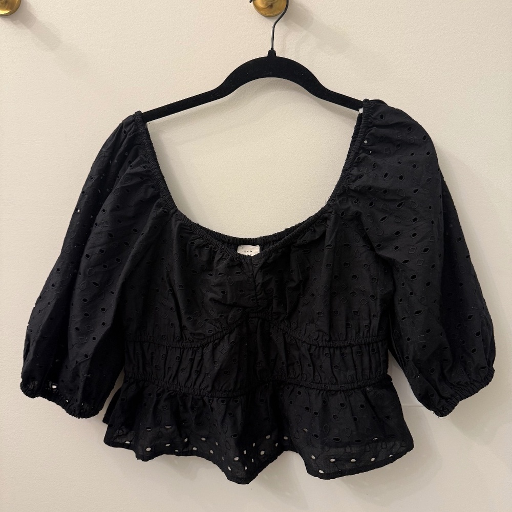 Peplum eyelet blouse